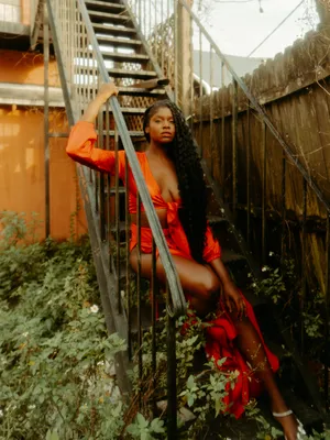 Sexy Black Woman Stairs Wallpaper