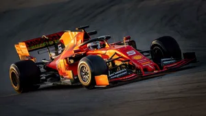 Sf90 Ferrari F1 2019 In Red And Yellow Wallpaper