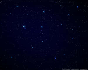 Shining Brightly In The Night Sky, These Four Bright Blue Stars Light Up The Night. Wallpaper