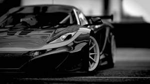 Shiny Black Sports Cars Wallpaper