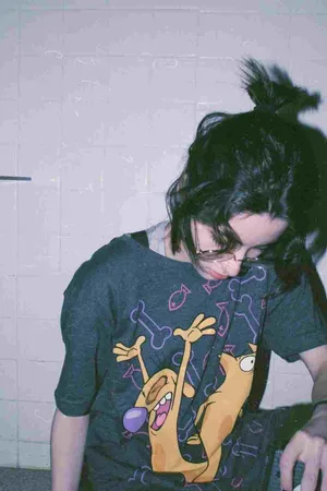 Shirt And Bun Girl Aesthetic Wallpaper