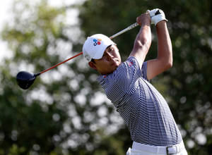 Si Woo Kim Concentrating Playing Wallpaper