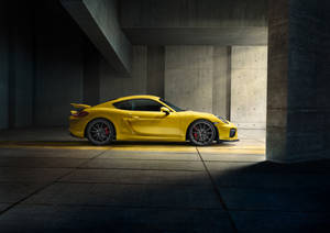 Side Porsche Cayman Gt4 Yellow Wallpaper