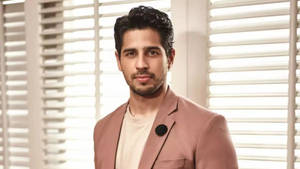 Sidharth Malhotra Old Rose Tuxedo Wallpaper