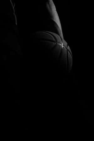 Silhouette Of A Black Basketball Wallpaper