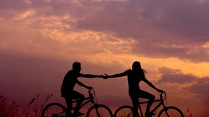 Silhouette Of Bike Ride Wallpaper