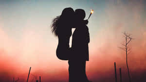 Silhouette Sunset Hug Sparkler Wallpaper