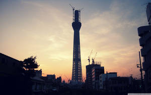 Silhouetted High-rise Building Under Construction Wallpaper