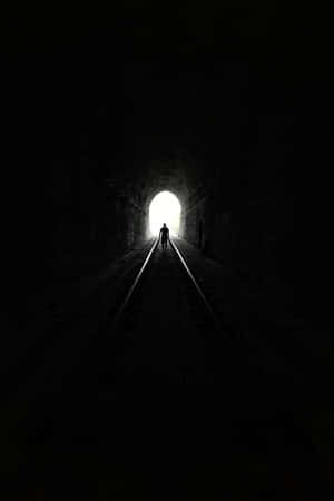 Silhouettein Tunnel Light End.jpg Wallpaper