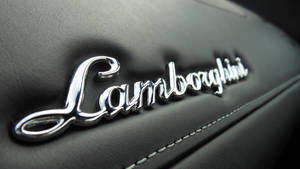 Silver Lamborghini Name Logo Wallpaper