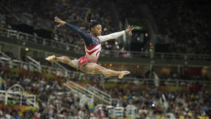 Simon Biles Split In Midair Wallpaper