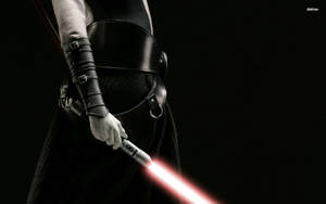 Sith With A Lightsaber Wallpaper