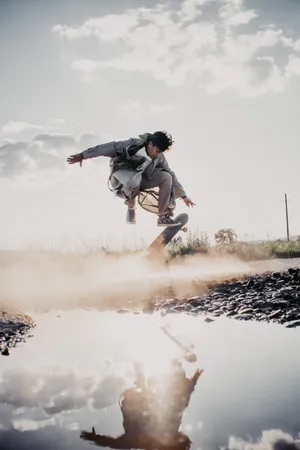 Skateboard Stunt Water Reflection Wallpaper