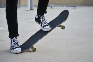 Skateboarding With Converse Chuck Taylors Wallpaper