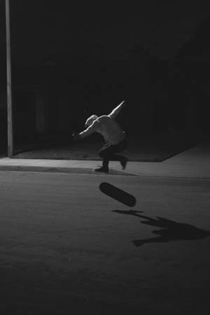 Skater Boy In The Dark Wallpaper