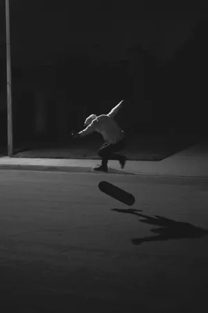 Skater Boy In The Dark Wallpaper