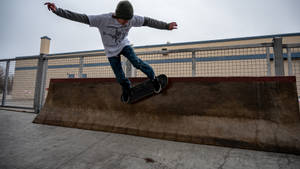 Skater Boy Wall Ride Trick Wallpaper