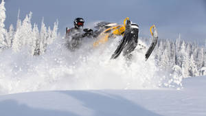 Ski Jumping Using Ski-doo Snowmobiles Wallpaper