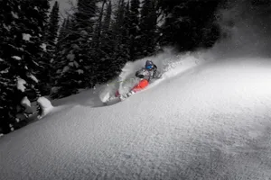 Skiing At Night Wallpaper