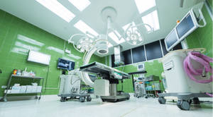 Skilled Entrepreneurs Operate In A Modern Mbbs Operating Room Wallpaper