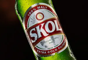 Skol Beer Bottle Closeup Wallpaper