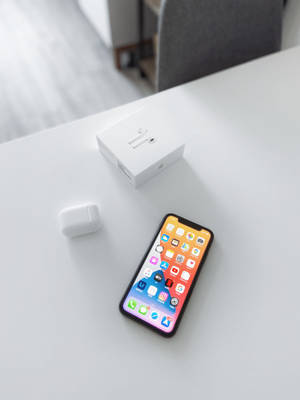 Sleek And Stylish Iphone 11 In Action Wallpaper