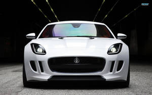 Sleek And Stylish Modern White Jaguar Car Wallpaper