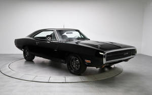 Sleek Matte Black 1969 Dodge Charger - Classic American Muscle Wallpaper