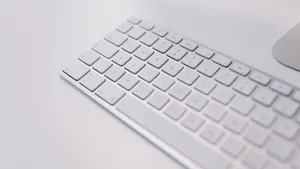 Sleek White Wireless Mac Keyboard Wallpaper