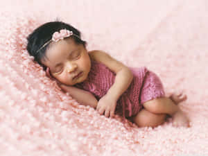 Sleeping Newborn Baby Pink Backdrop Wallpaper