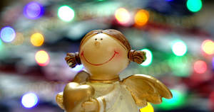 Smiling Christmas Angel Wallpaper