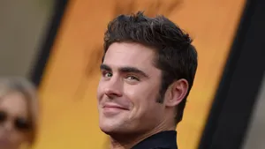 Smiling Zac Efron Wallpaper