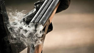 Smoking Hunting Shotgun Wallpaper