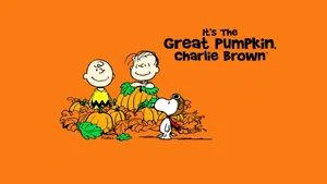 Snoopy Amidst Falling Autumn Leaves Wallpaper