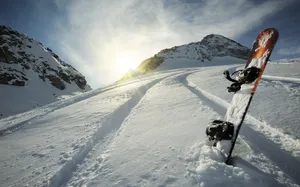 Snowboard Stuck In The Snow Wallpaper
