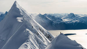 Snowboarding On Mountains Wallpaper