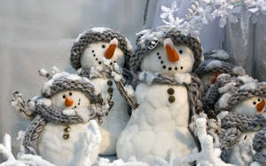 Snowman With Grey Knitted Scarves Wallpaper