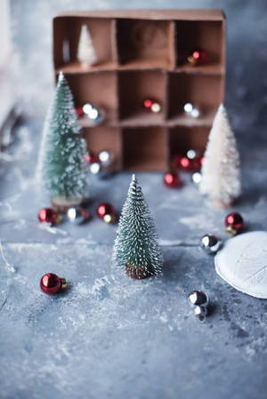 Snowy Christmas Tree Miniatures Wallpaper