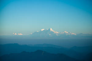 Snowy Mountain With Beautiful Blue Sky Wallpaper