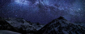 Snowy Mountains At Night Dual Monitor Wallpaper