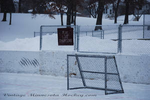 Snowy Outdoor Rink Hockey Gate Wallpaper