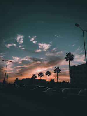 Soak Up The Beauty Of The City Sunset Wallpaper
