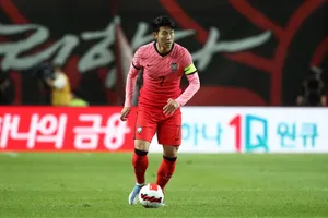 Soccer_ Player_in_ Action_on_ Field Wallpaper