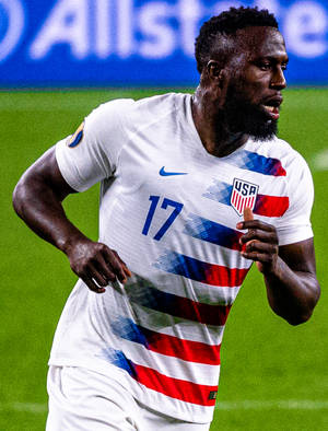 Soccer Player Jozy Altidore Running Stance Wallpaper