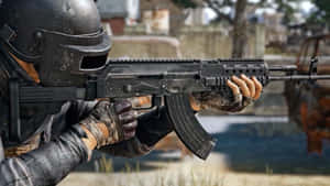 Soldier Holding Assault Rifle Wallpaper