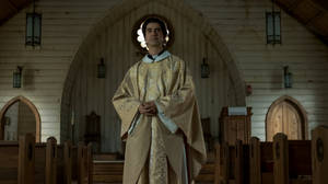 Solemn Midnight Mass With Father Paul In The Chapel Wallpaper