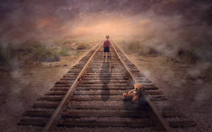 Solitary Boy On Railway Track Wallpaper