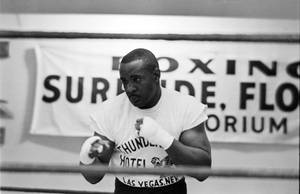 Sonny Liston Wearing Hand Wraps Wallpaper