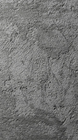 Sophisticated Grey Iphone Against Rough Concrete Wall Wallpaper