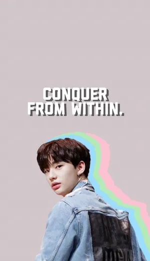 South Korean Singer Hyunjin Looking Over His Shoulder Wallpaper